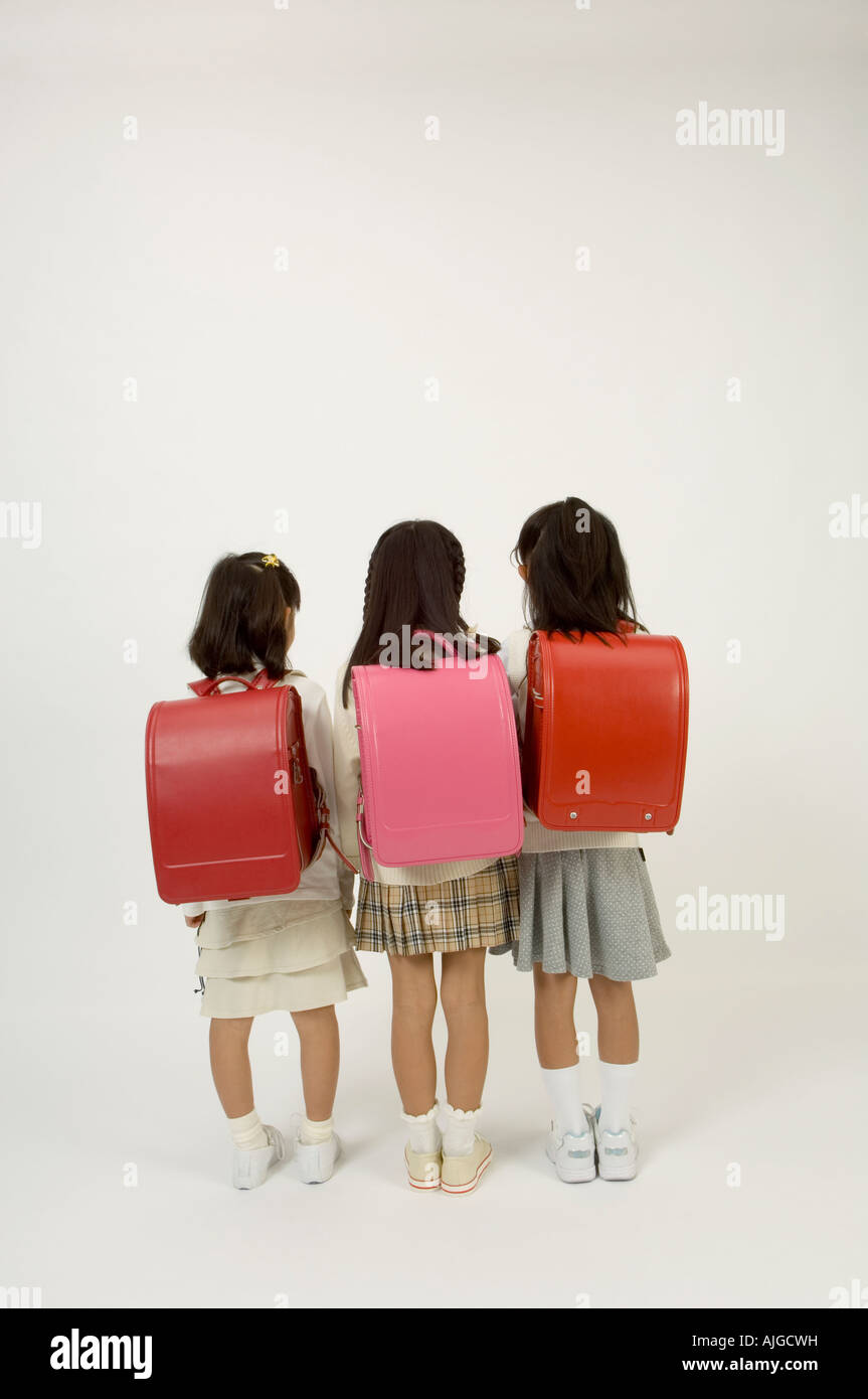 Three girls rear view hi-res stock photography and images - Alamy