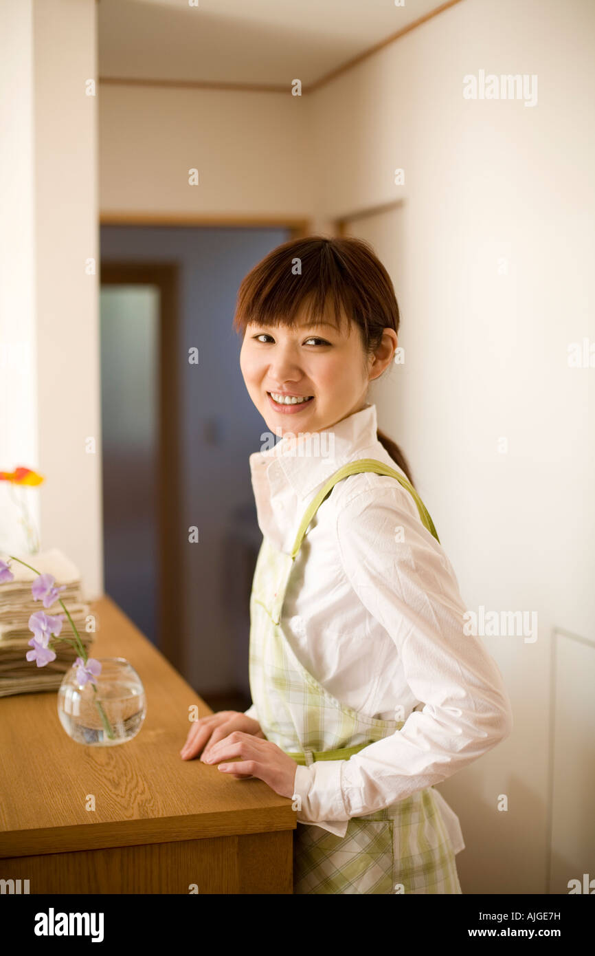 Woman wearing an apron hi-res stock photography and images - Alamy