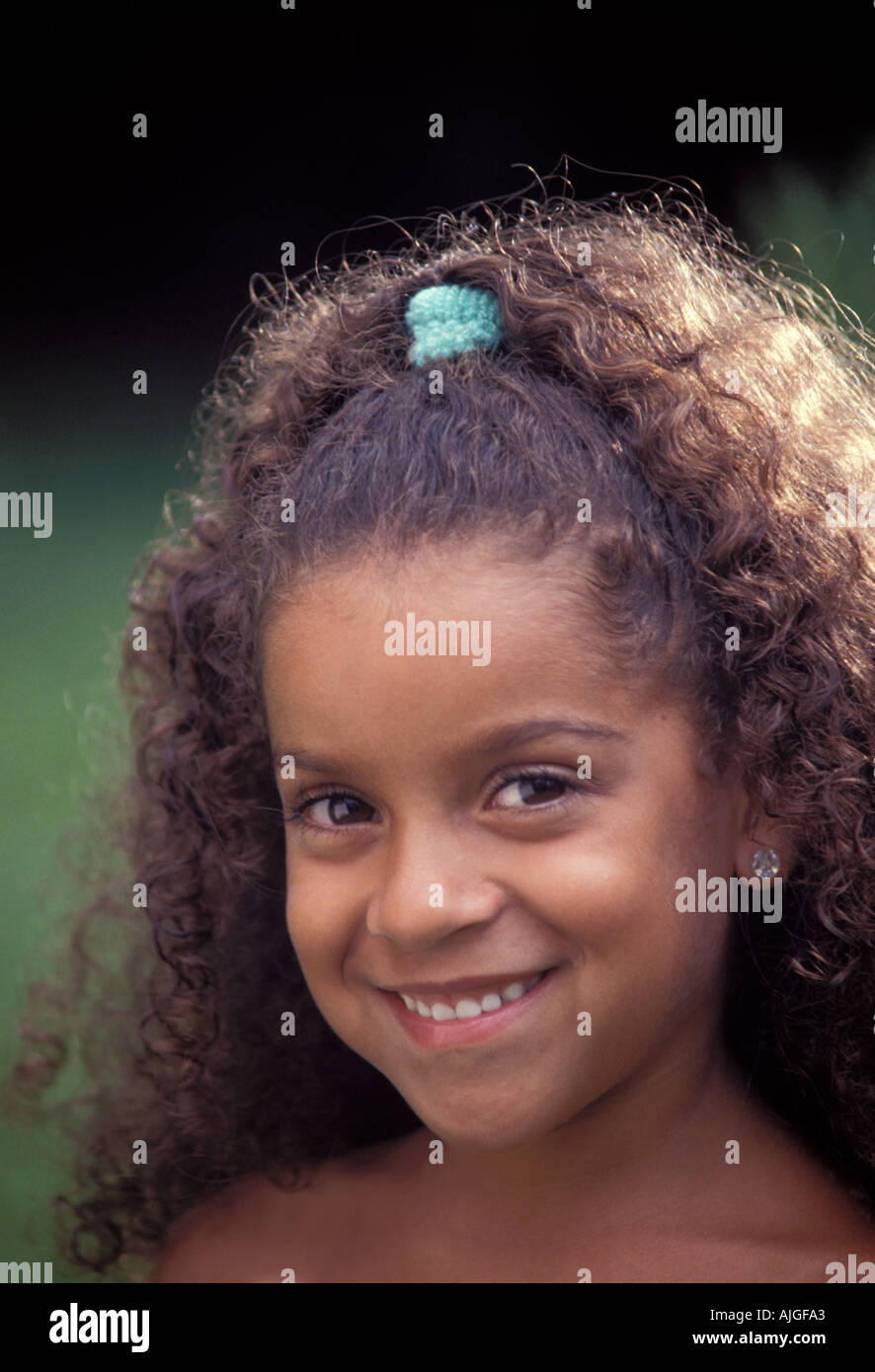 Young African American girl smiles Stock Photo