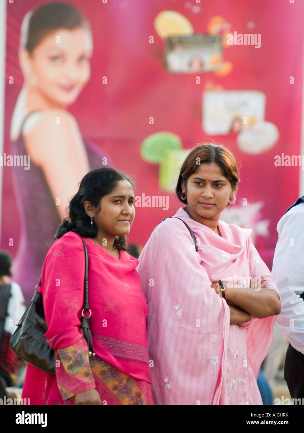 Consumers pass consumer brand icons at a trade fair Stock Photo