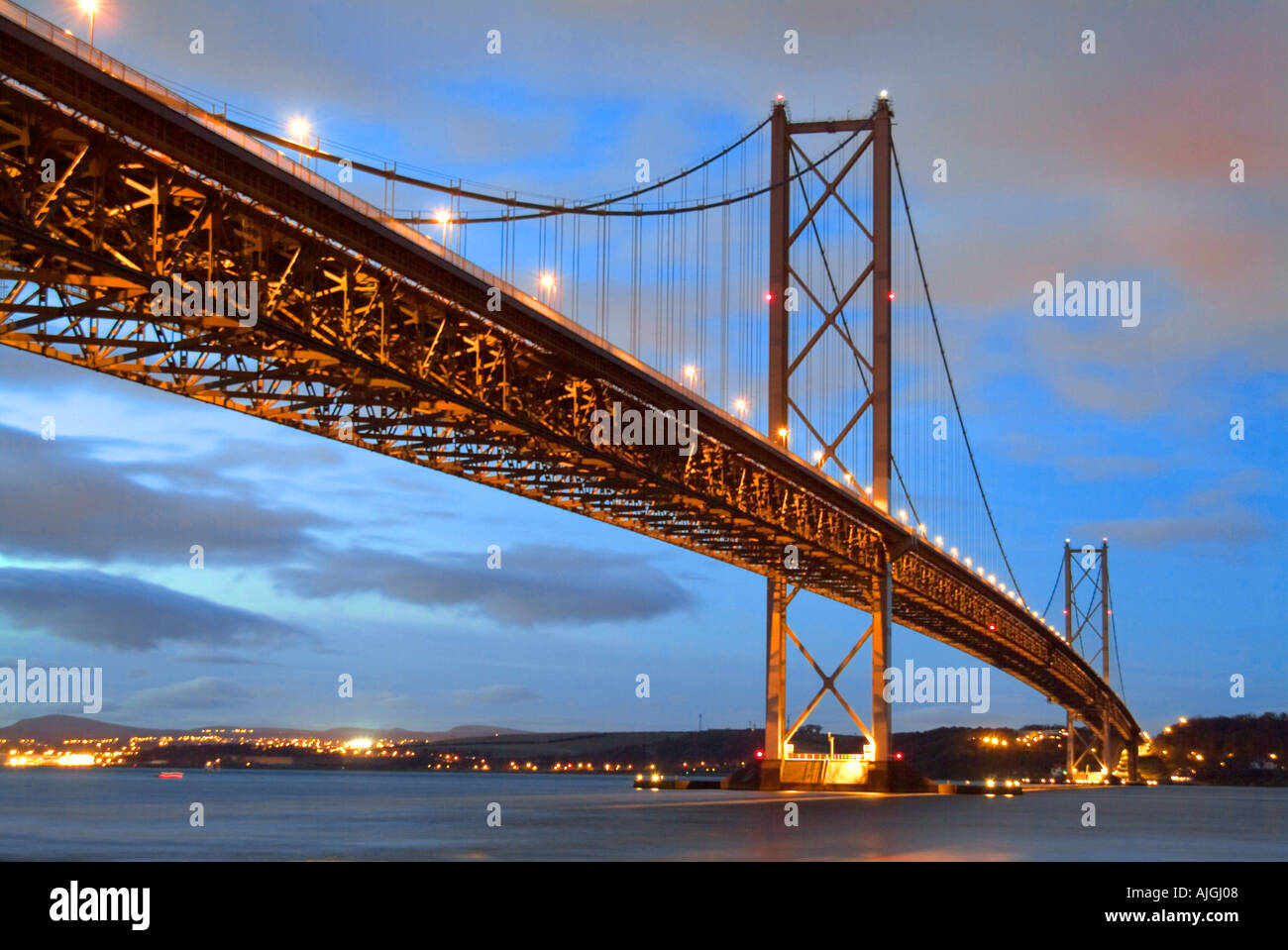 the forth road bridge spanning  the river forth in scotland connecting the kingdom of fife and edinburgh Stock Photo