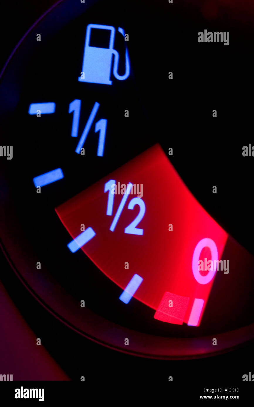 Fuel gauge dropping to empty Stock Photo Alamy