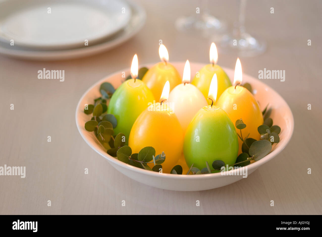 Egg-shaped candles Stock Photo