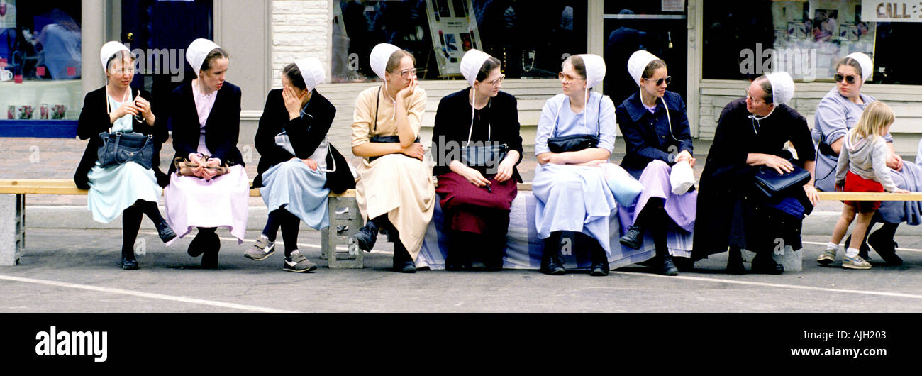 Mennonite women prepare to watch parade at the Holland Mich Tulip
