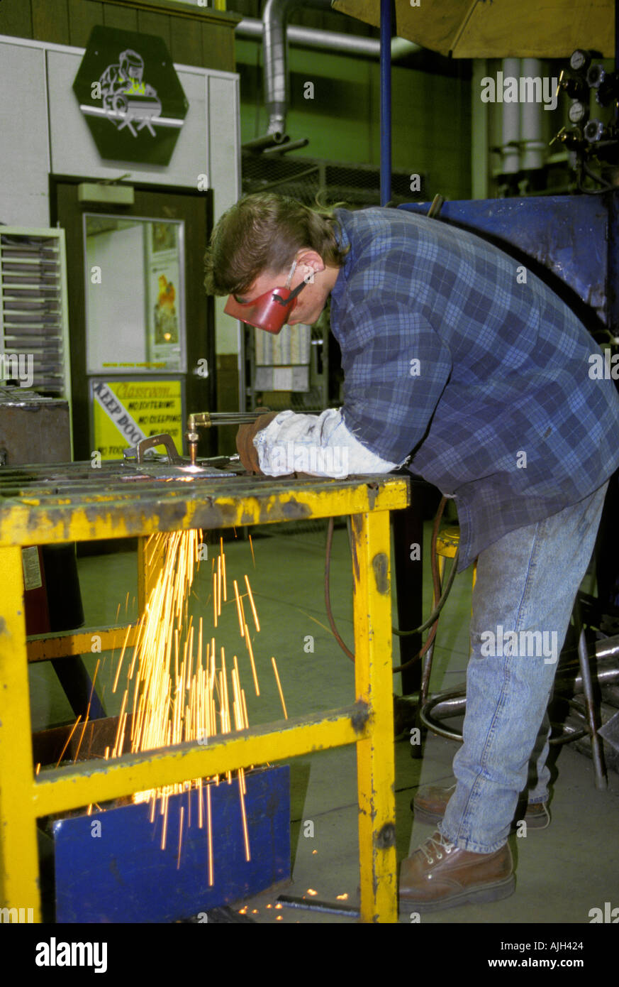 Vocational education Minority male high school students take training in Welding Stock Photo