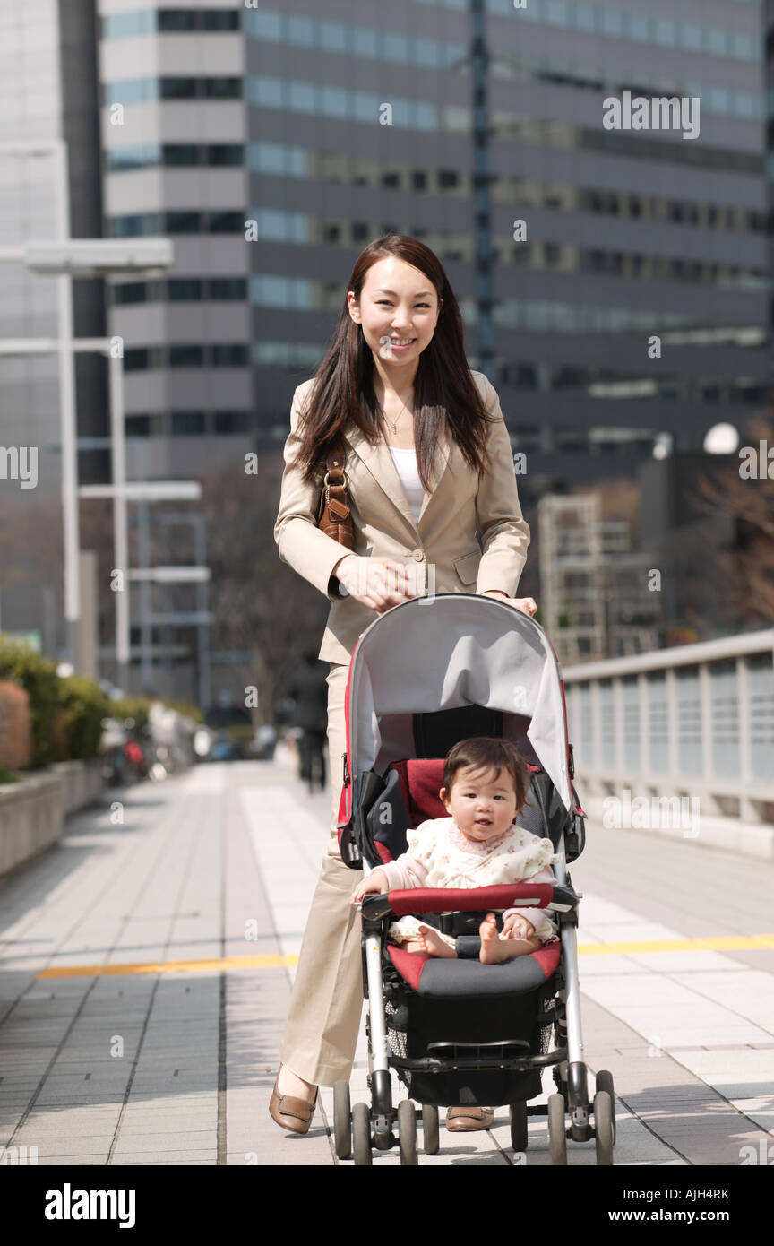 Businesswoman baby stroller hi-res stock photography and images - Alamy
