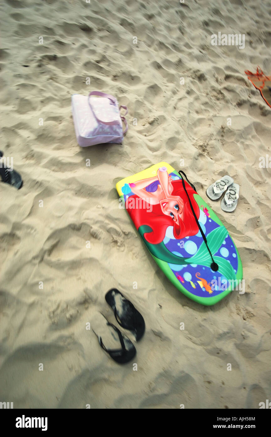 kids day at the beach boogy board flip flops Stock Photo - Alamy