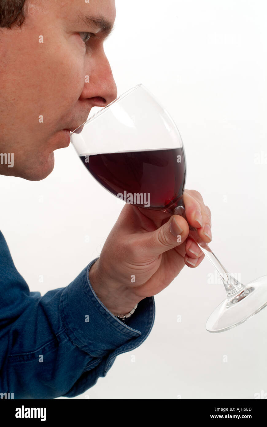 man tasting a glass of wine Stock Photo