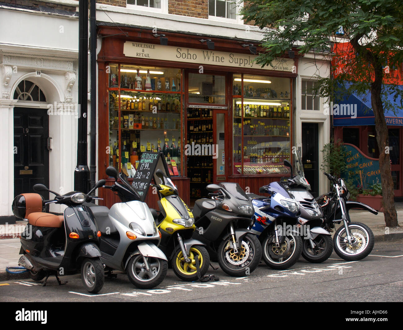 Motorcycles and scooters Soho London Great Britain Stock Photo Alamy