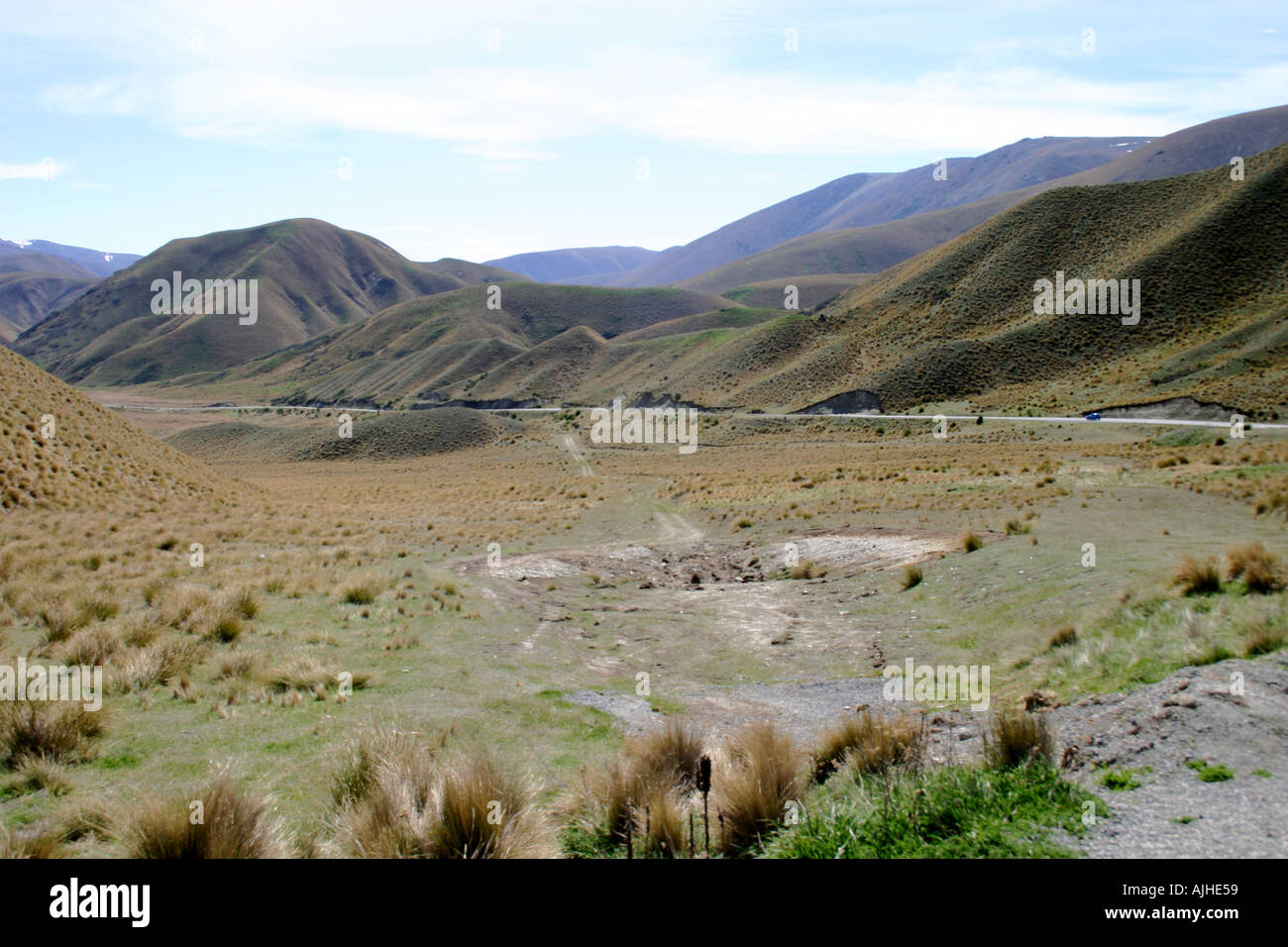 Lindis Pass golden tussock grass country South Island New Zealand Stock Photo