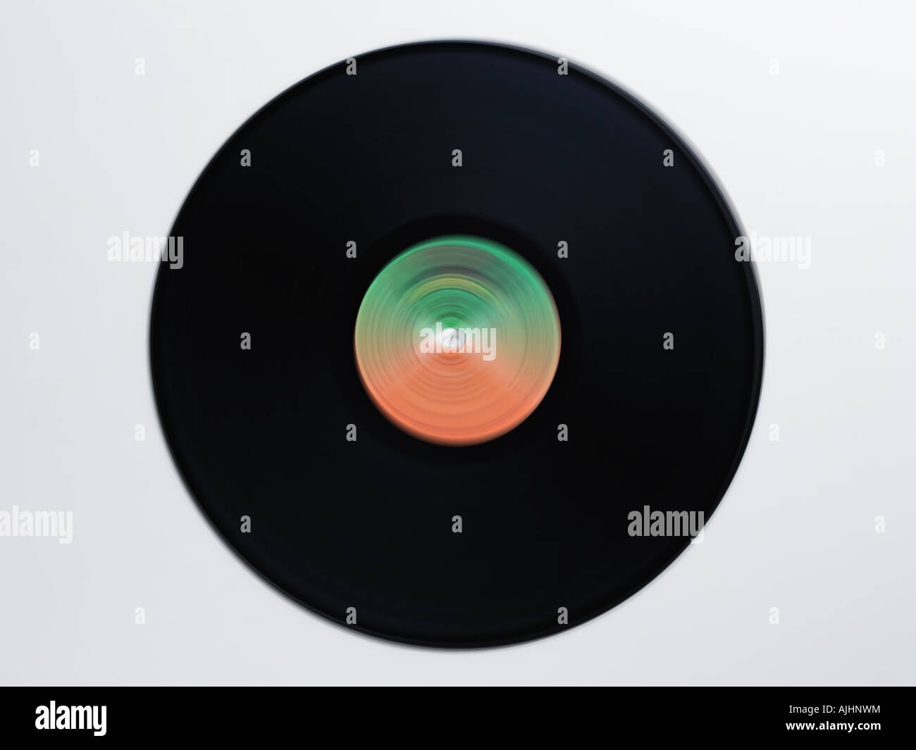 Spinning vinyl record on white background - motion blur Stock Photo - Alamy