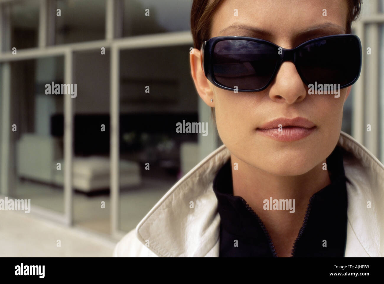 Woman outdoors brunette sunglasses hi-res stock photography and images ...
