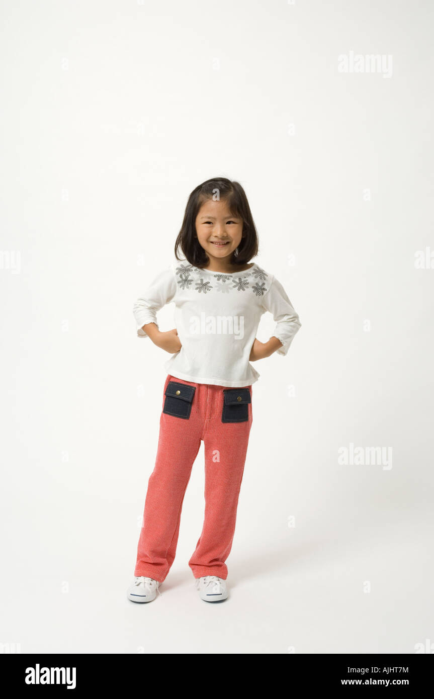 Elementary age girl standing Stock Photo