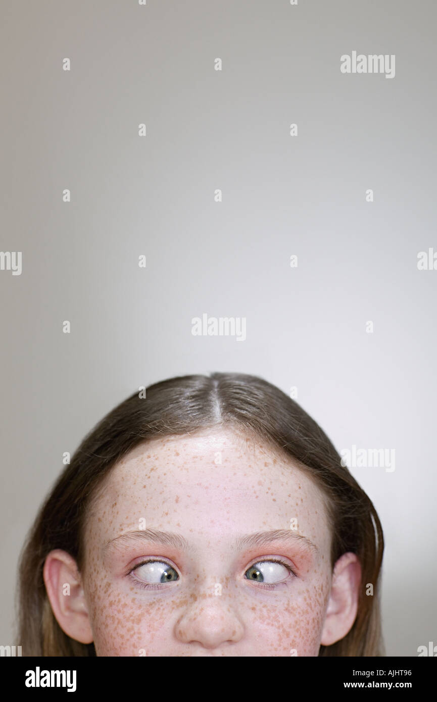 Girl crossing her eyes Stock Photo Alamy