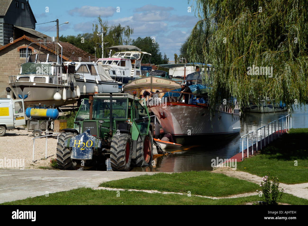 H2O Boatyard Burgundy France Tractor and Roodberg Trailer Stock Photo -  Alamy