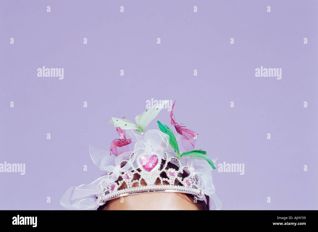Girl wearing a decorated tiara Stock Photo