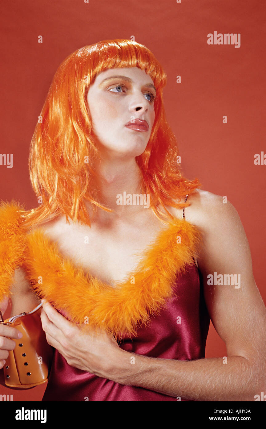 Drag queen wearing an orange outfit Stock Photo