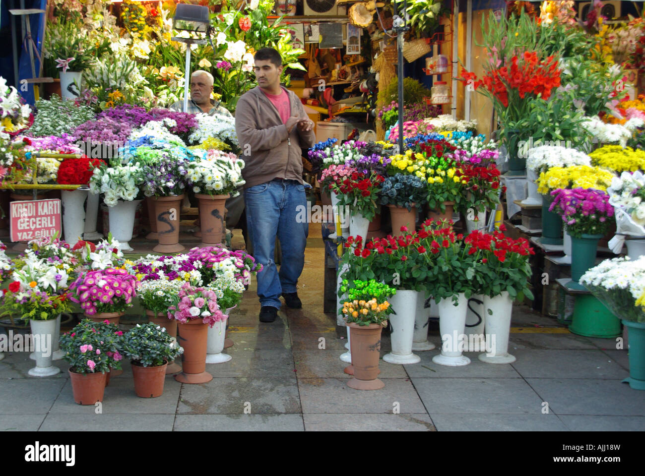 Group portrait of several young guys and one elderly man near stall with  turkish bagel at Taksim in Beyoglu, Istanbul Stock Photo - Alamy