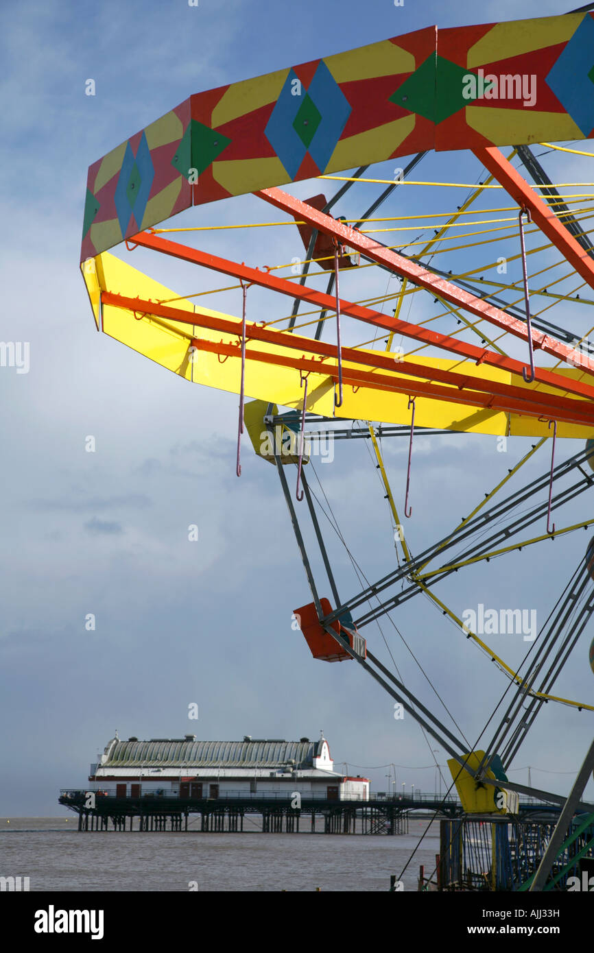 Rides on the beach at the North Promenade, Cleethorpes, with the Pier in the background. Stock Photo