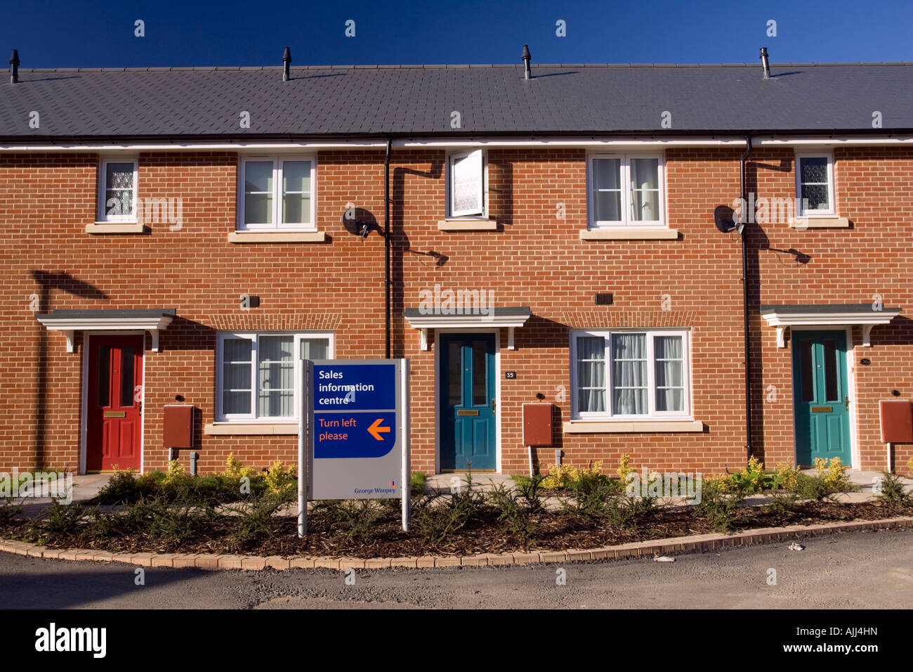 New red brick terraced houses for sale Cheltenham UK Stock Photo Alamy