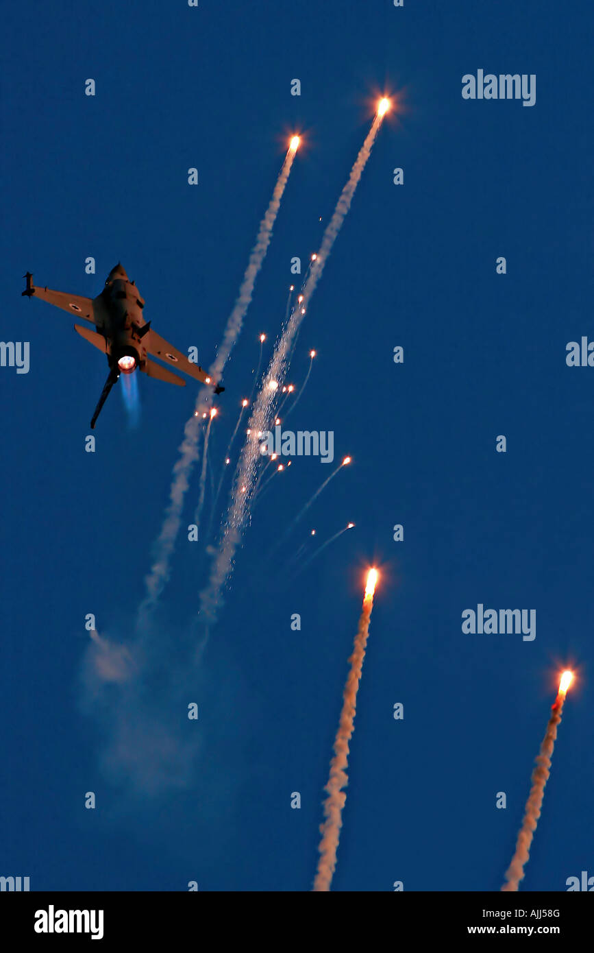 IAF F16I Fighter jet and flares Stock Photo