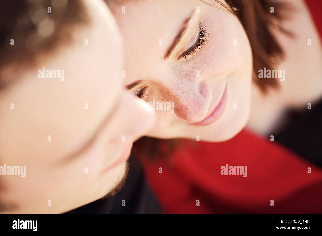 Couple with their heads together Stock Photo