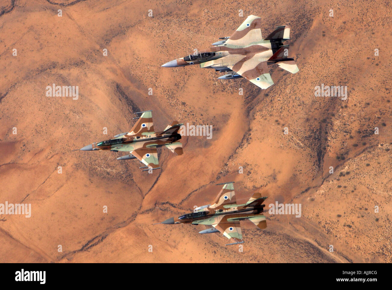 A formation of 2 F16 and one F15 Israeli Air Force fighter jets flying over  the Judea mountains Dead sea area Stock Photo - Alamy