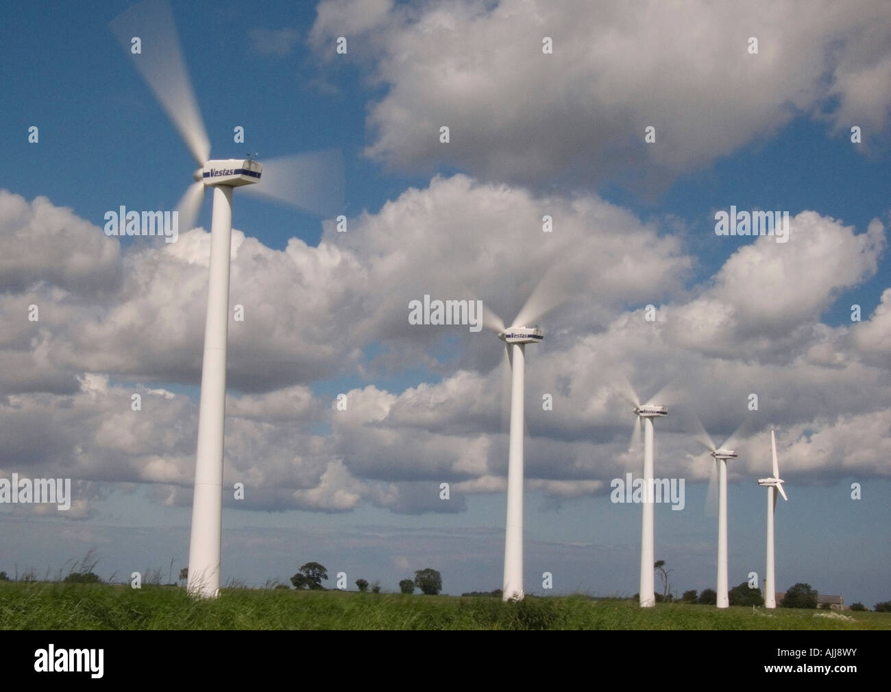 Row of wind turbines working Stock Photo