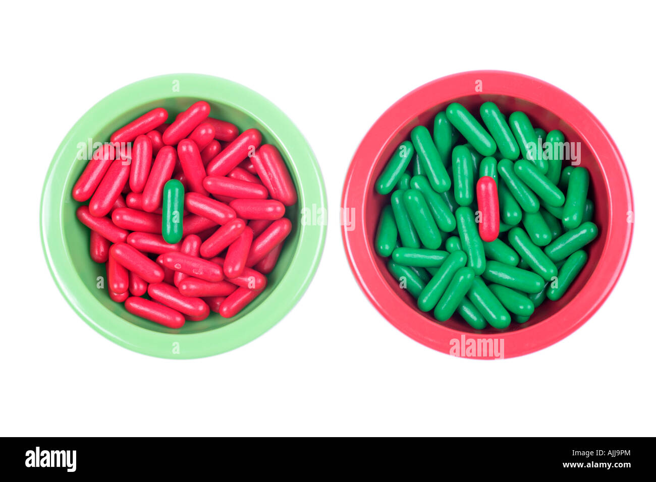 green and red bowls with sweets Stock Photo Alamy