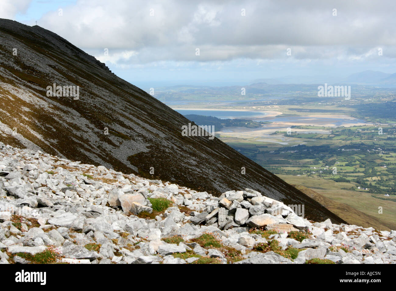 'Table Top' mountain scree and view (aka Muckish mountain) over Clonmass bay towards Downings