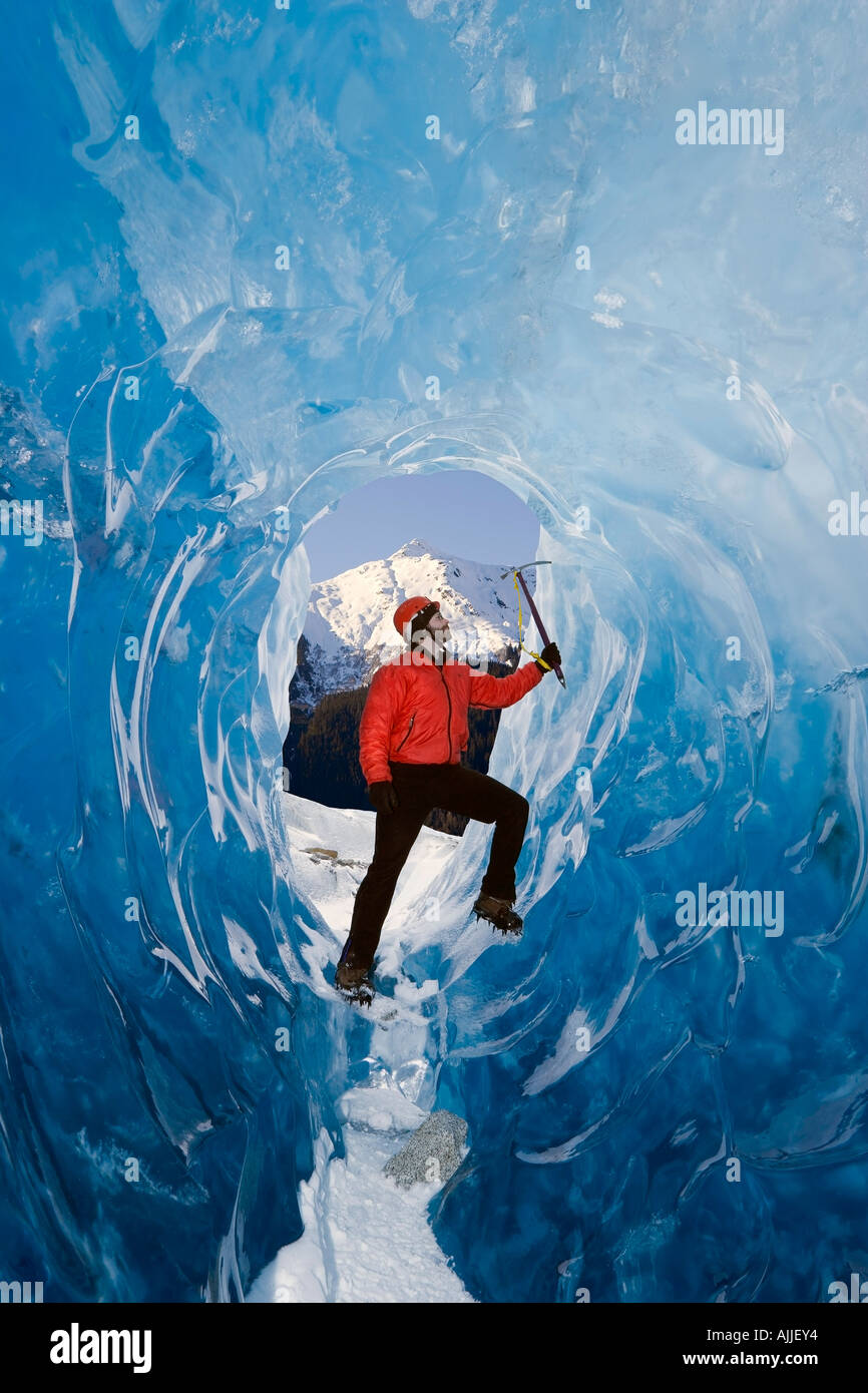 Male ice climber inside ice cave Mendenhall Glacier Tongass National Forest Southeast Alaska Spring Stock Photo