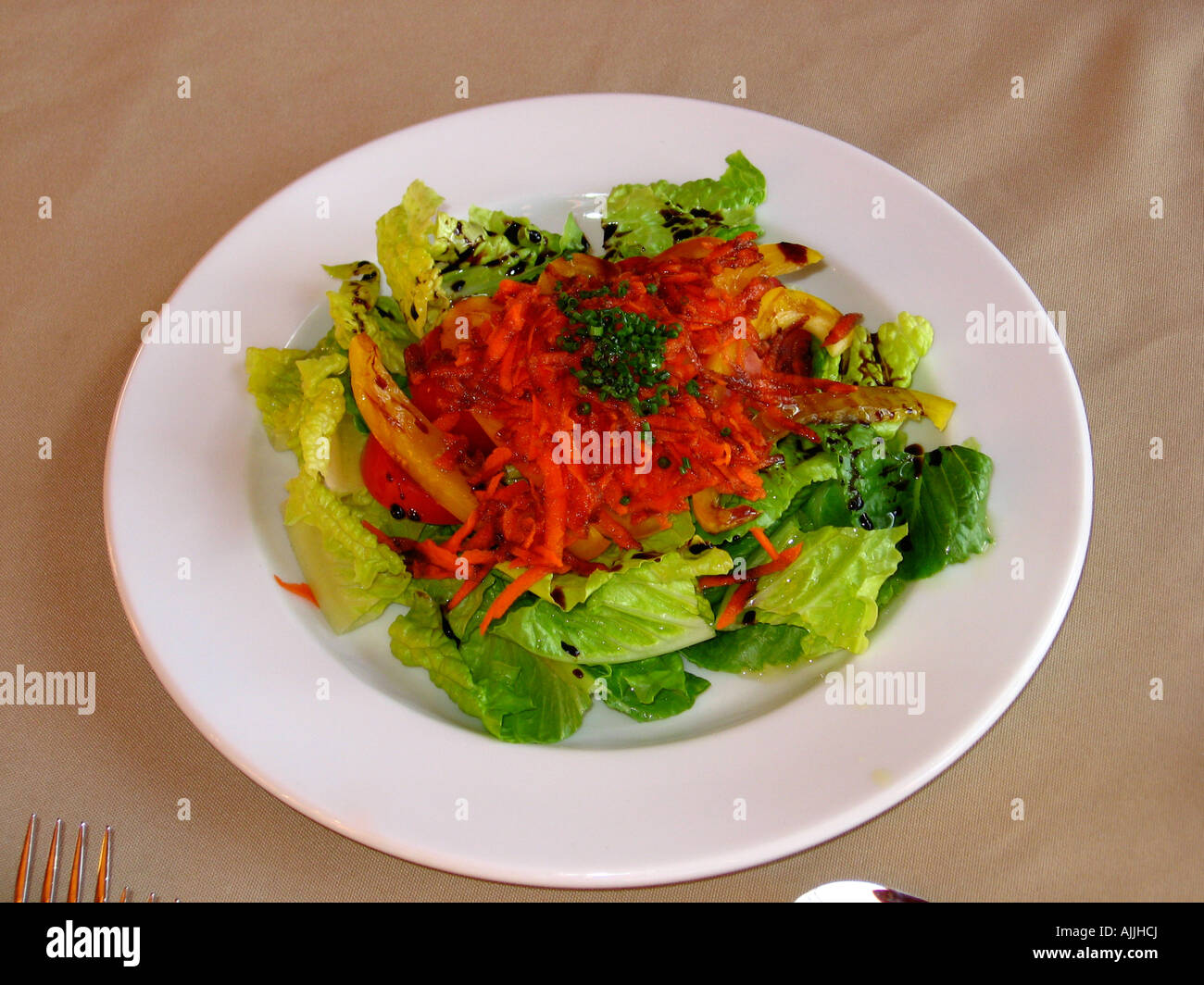 Mixed green salad with basalmic vinegar dressing Stock Photo Alamy
