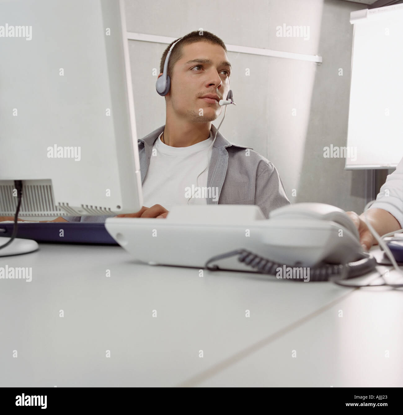 Male call centre operator Stock Photo