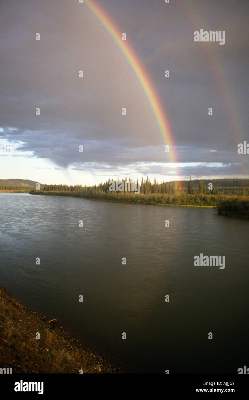 Rainbow Over Yukon River Near Dawson Canada Autumn Stock Photo Alamy