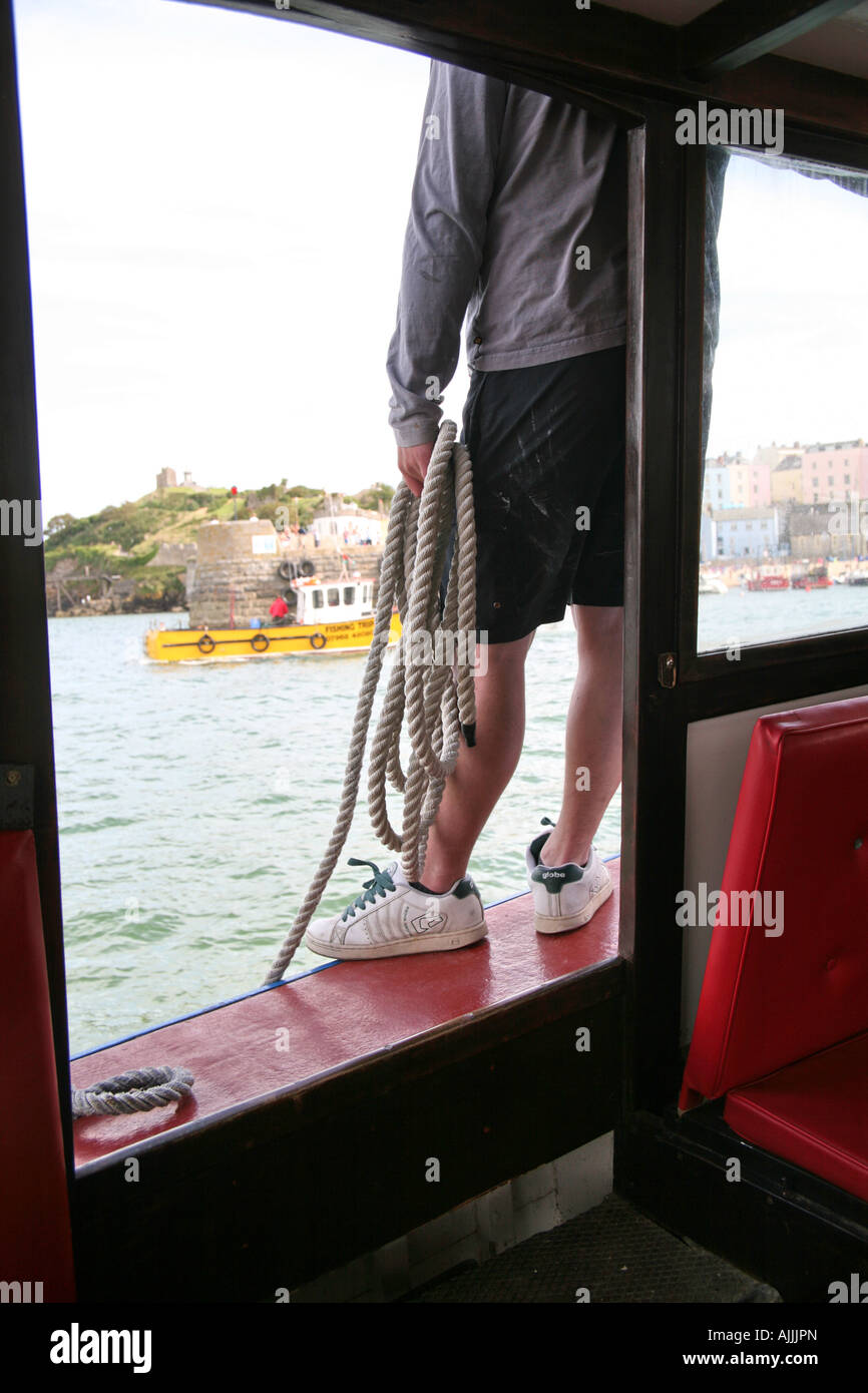 man mooring pleasure boat Stock Photo