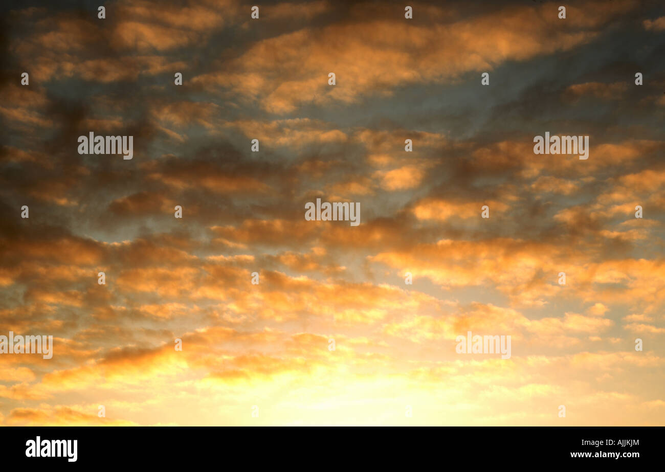Clouds sky at sunset Stock Photo - Alamy