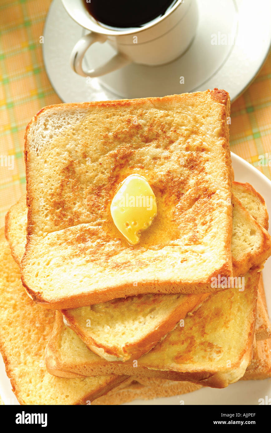 High Angle View Of A Dollop Of Butter On Toasts Stock Photo Alamy
