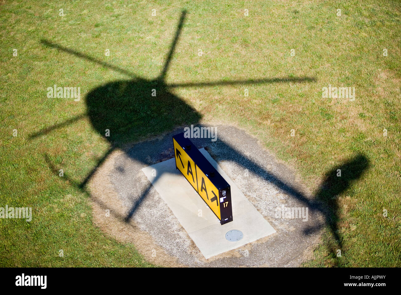 Shadow of MD 500 helicopter over runway, Virginia Beach, Virginia Stock Photo