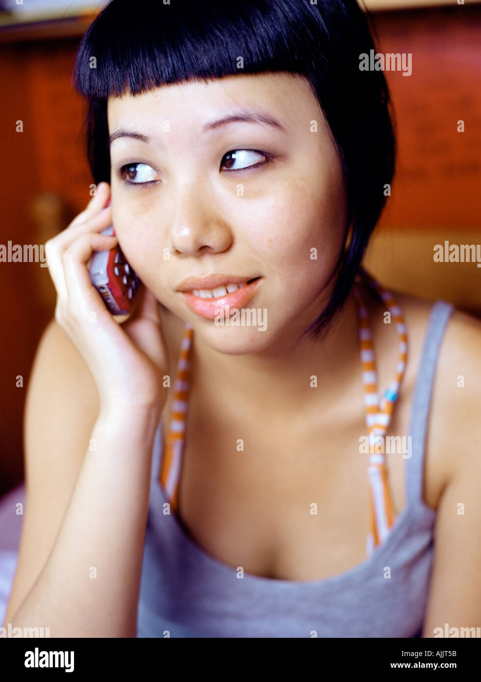 Teenage girl using cellular telephone Stock Photo Alamy