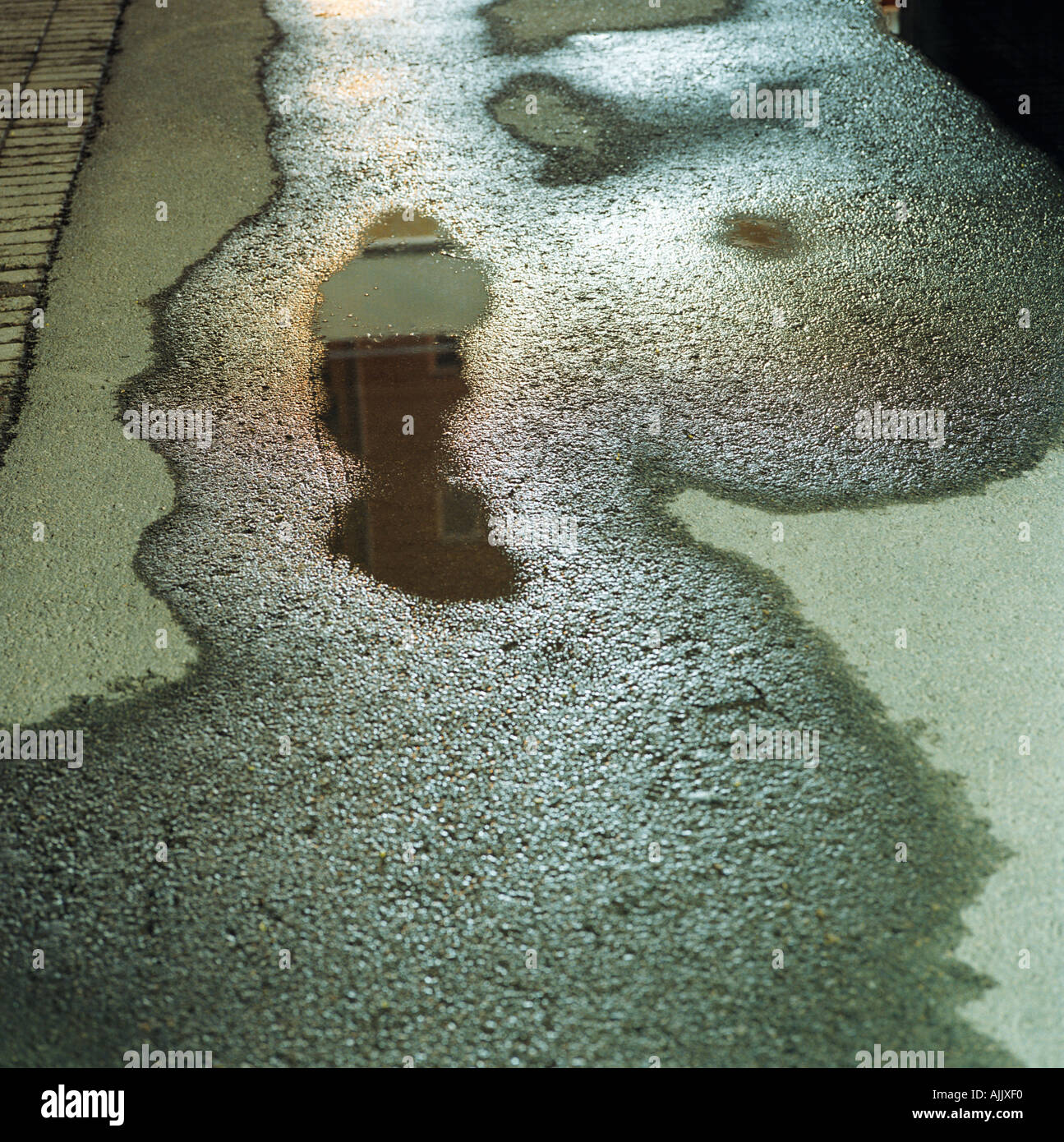 An oily puddle Stock Photo 4817647 Alamy