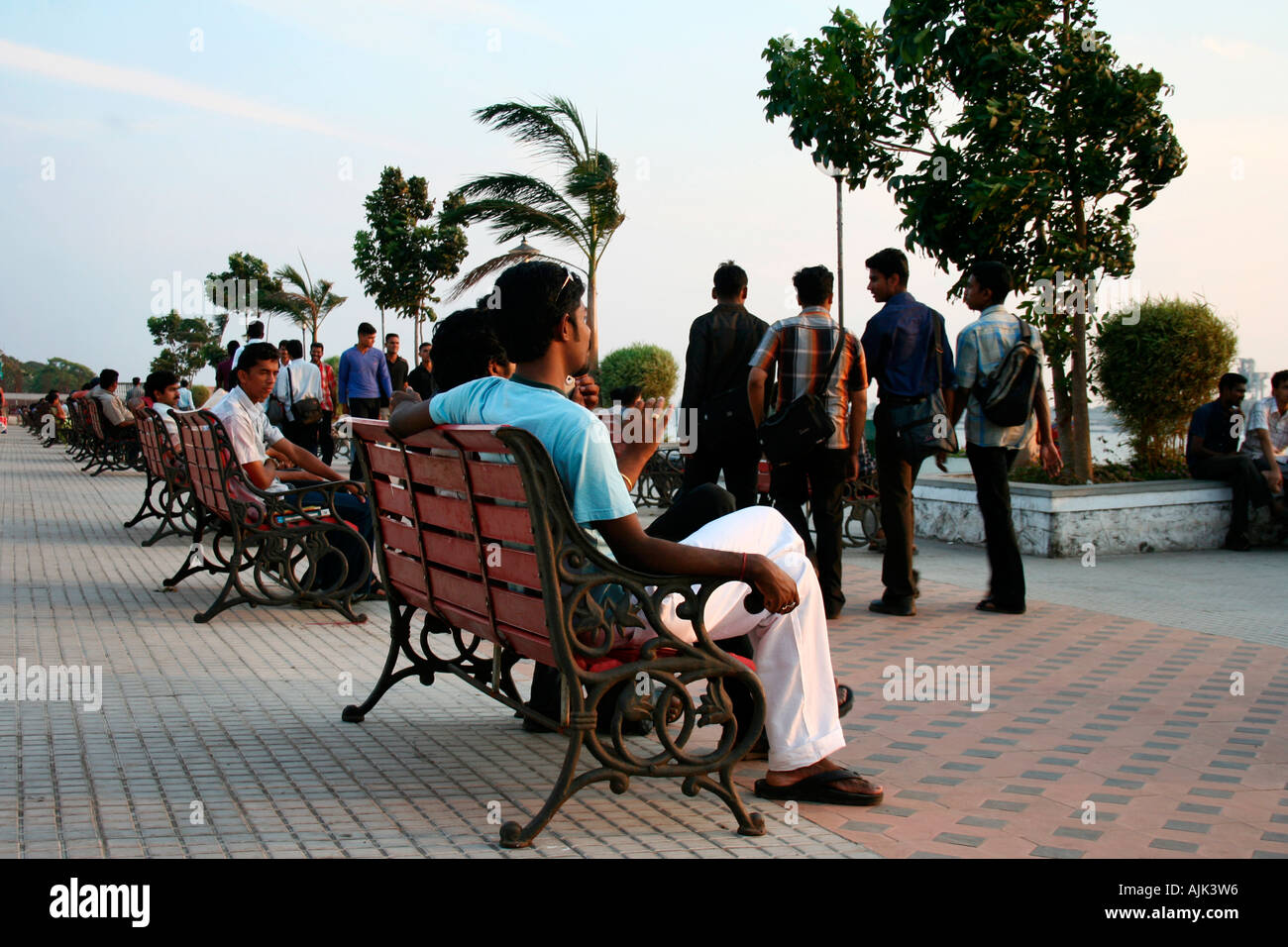The promenade becomes a perfect meeting point for the youngsters after college hours at Kochi, Kerala, India Stock Photo