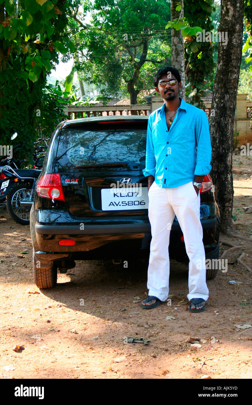 Stylish hipster arab man guy in sunglasses posed outdoor in street and  sitting on the trunk his black muscle car. Rich black man. Stock Photo |  Adobe Stock