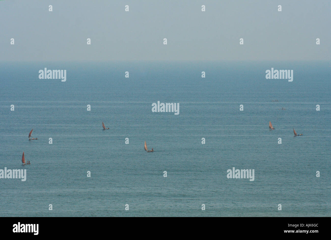 The beautiful view of an array of boats setting sail from Vizhinjam coast, Kerala Stock Photo