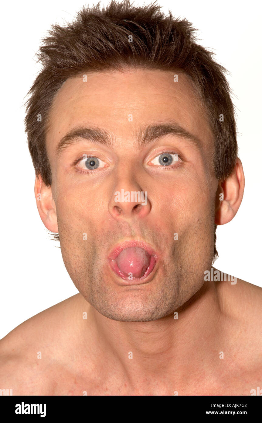 close up of a man sticking his tongue out Stock Photo