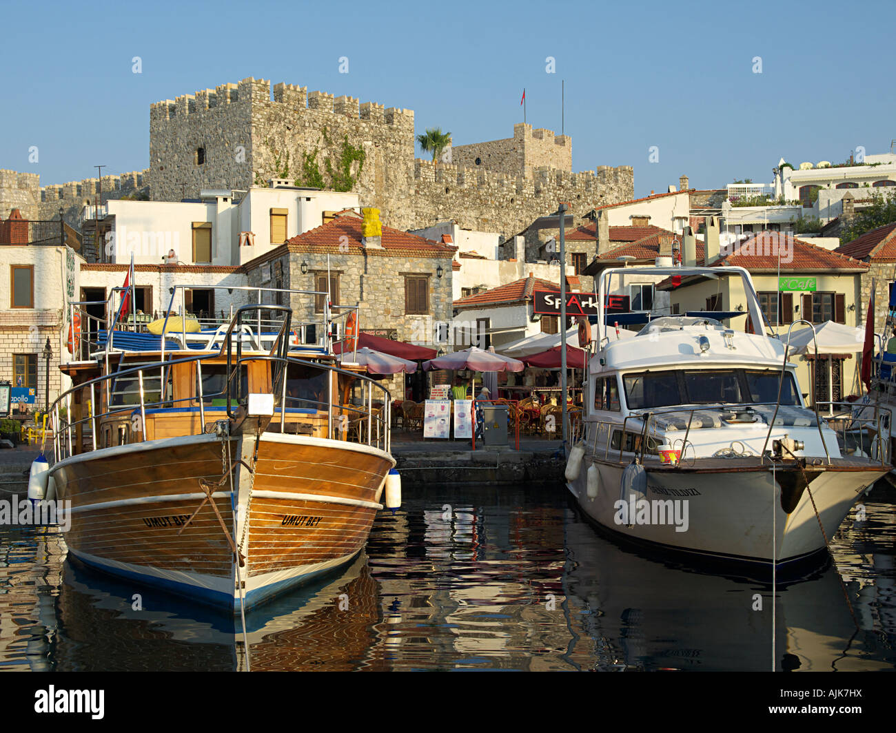 MARMARIS OLD TOWN WITH CASTLE AND MOORED BOATS AT QUAYSIDE, MARMARIS TURKEY Stock Photo