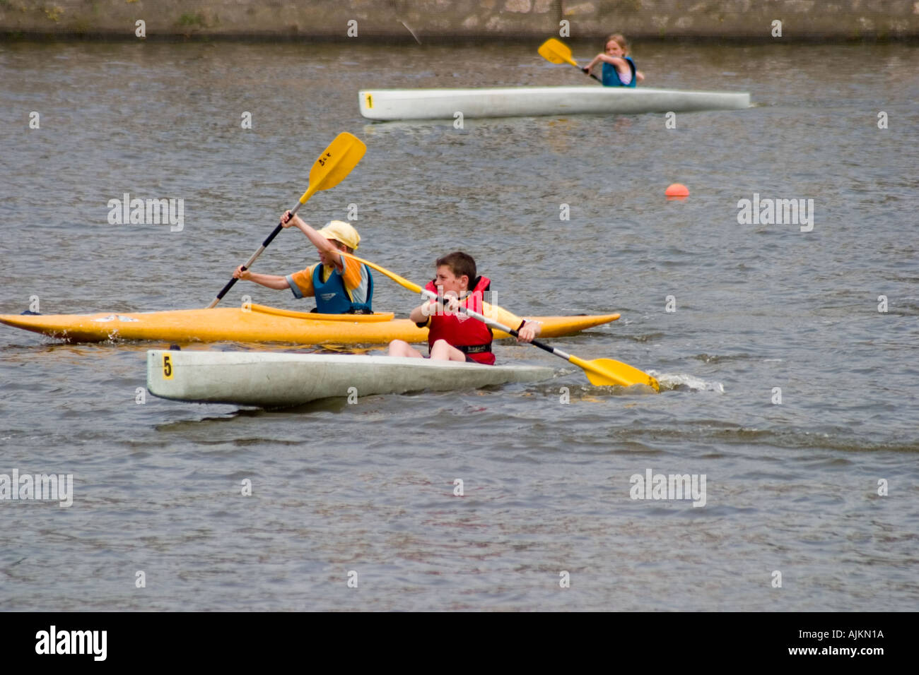 Schoolchildren take a canoeing lesson on the River in Boulogne Pas de Calais Stock Photo