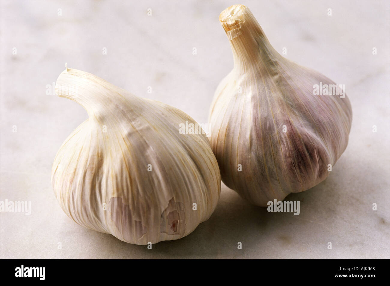 Two bulbs of garlic Stock Photo Alamy