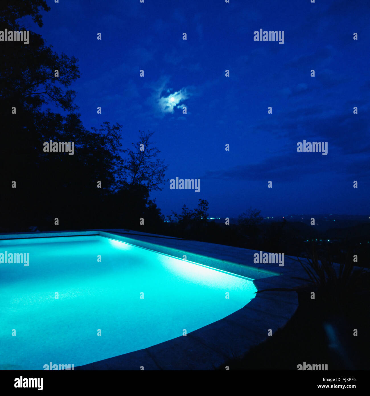 A swimming pool at night Stock Photo