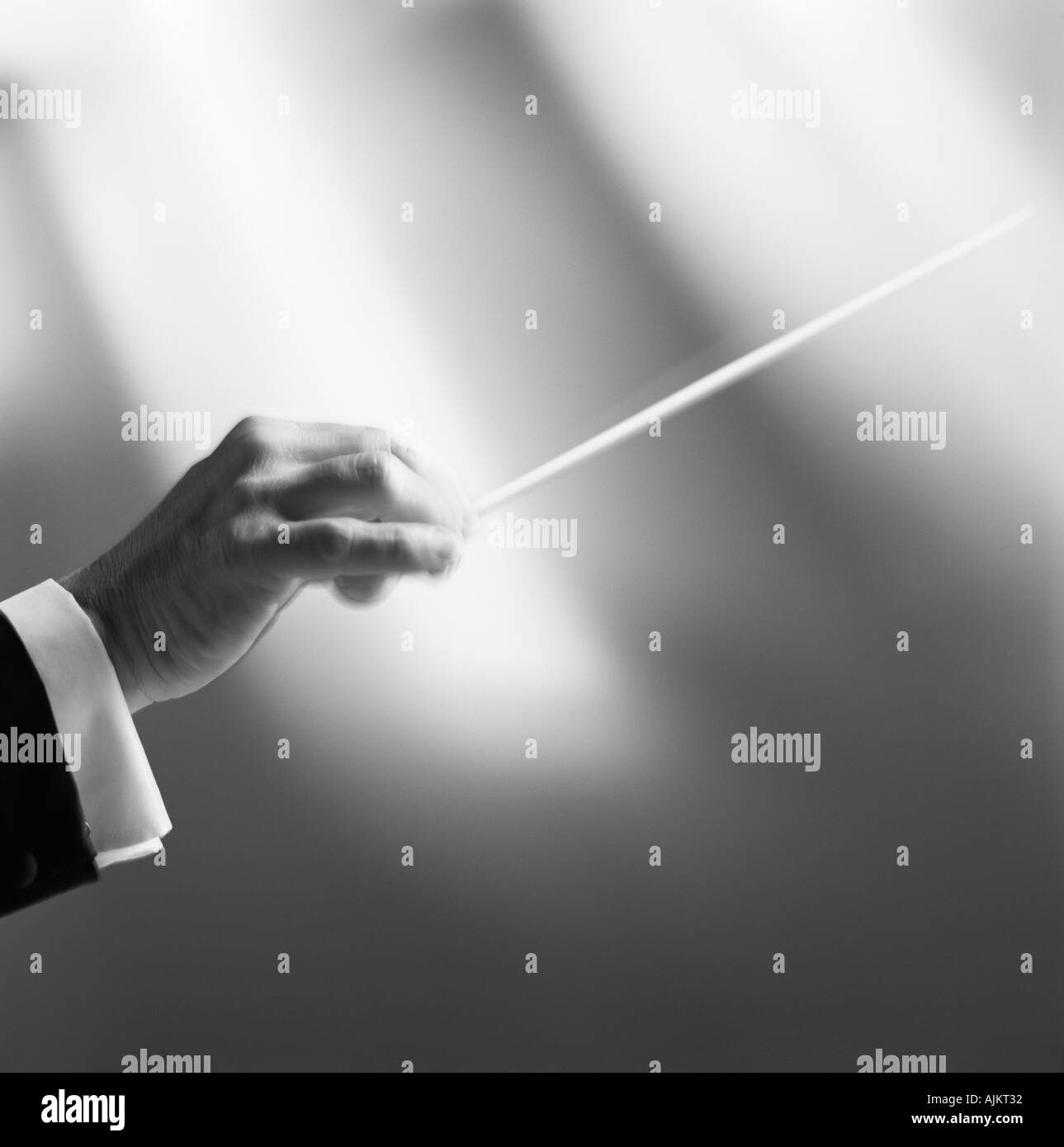 Conductor with baton Stock Photo Alamy