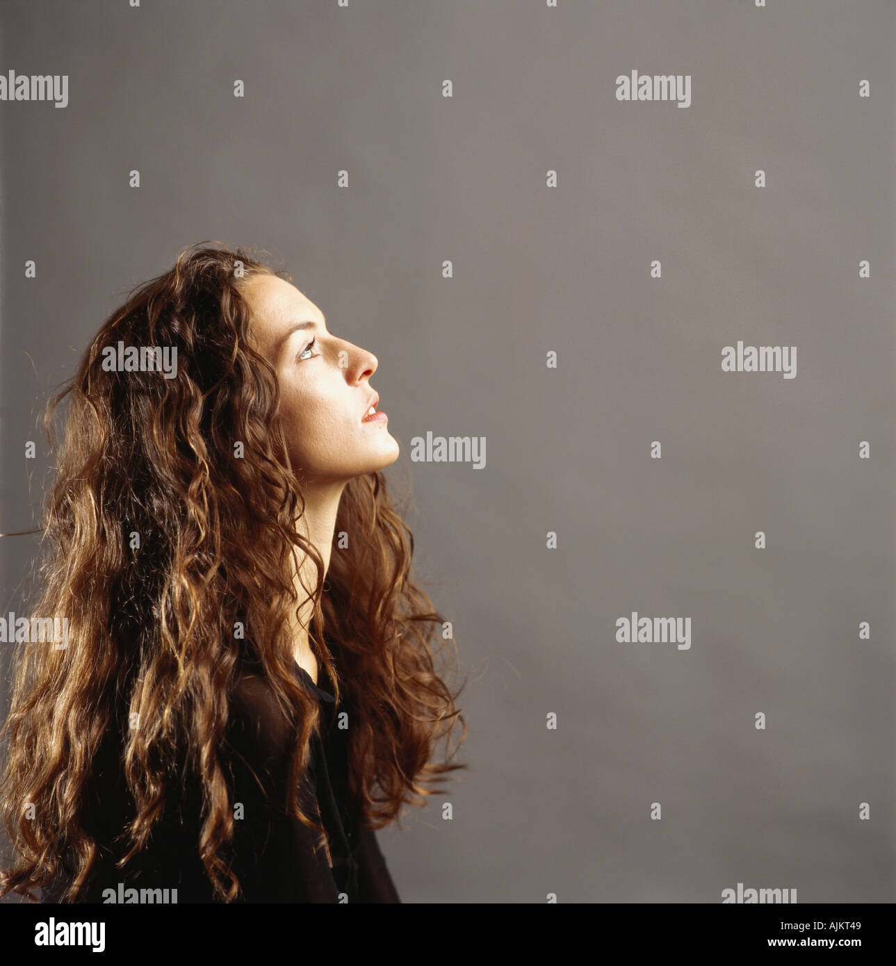 Profile of young woman Stock Photo